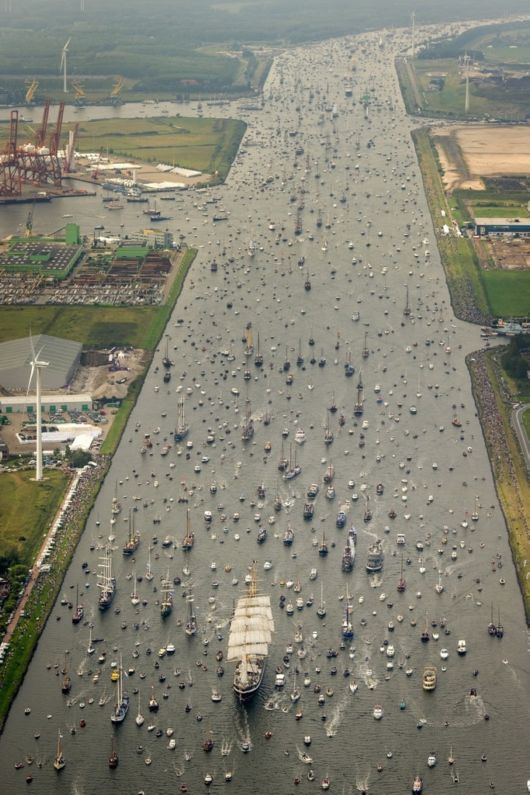 A Parade Of Boats In Amsterdam